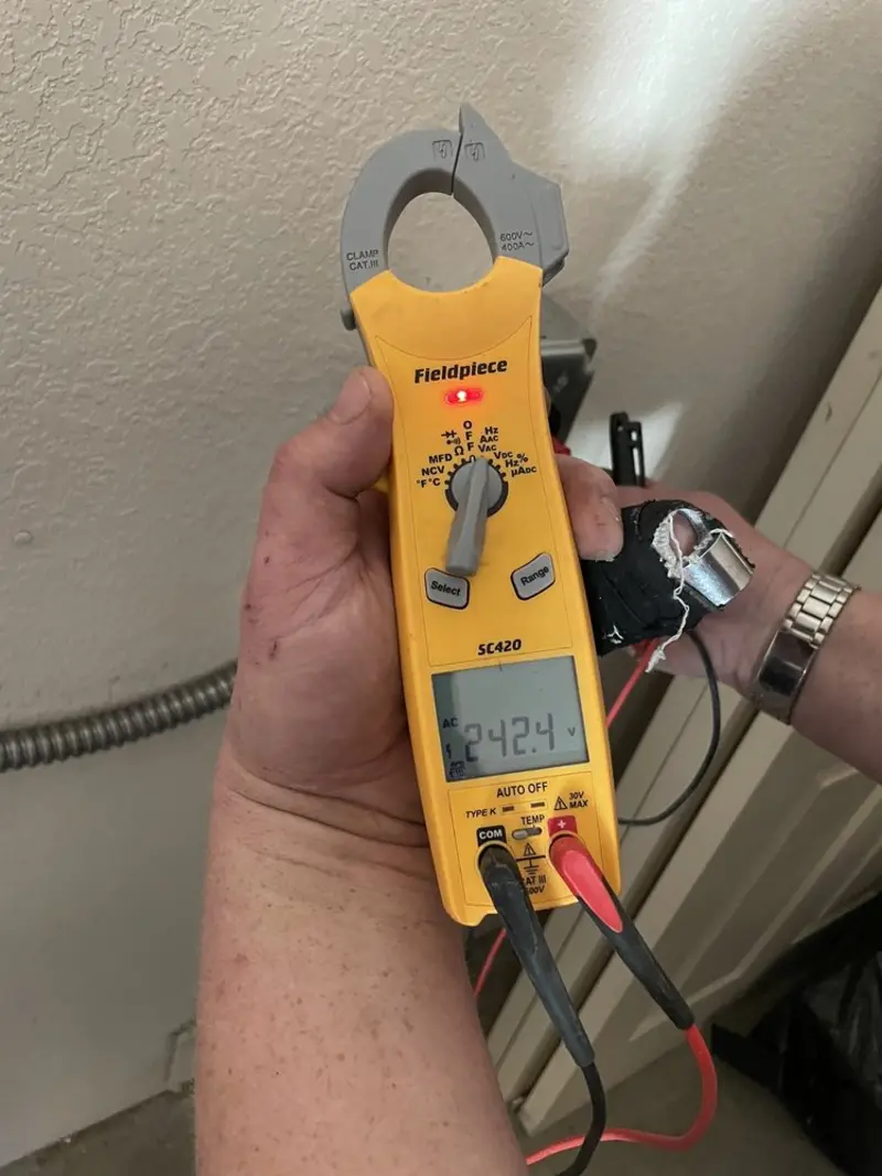 Voltage testing with clamp meter during Aluminum Wiring Replacement in South Tucson